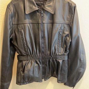 Excellent condition heavy leather coat with west